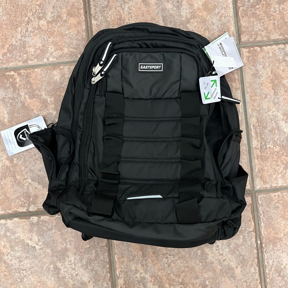 Black Tactical Backpack with Durable Fabric and Multiple Straps